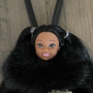 Doll bag charm , key chain wearing  fluffy faux fur coat with purse